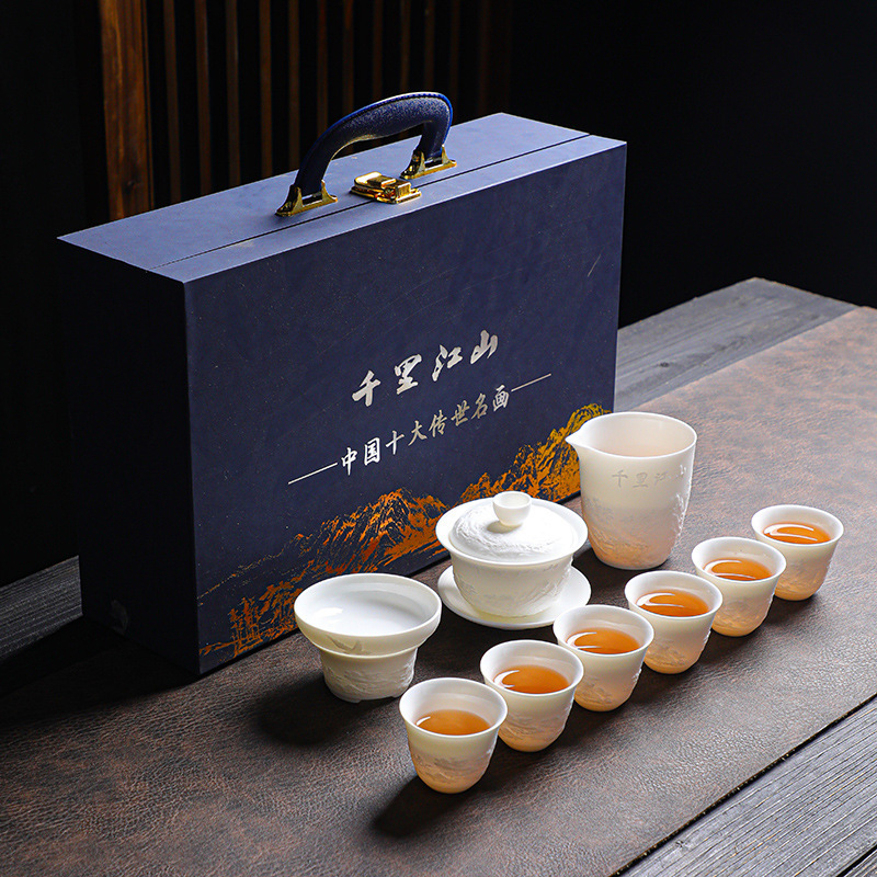 Dehua embossed sheep fat jade kung fu tea set business household gift gift set complete set accompanying hand gift belt gift box