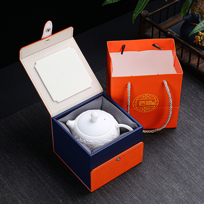 White porcelain embossed Xishi pot Fengming pot sheep fat jade dragon and phoenix auspicious tea pot veggie fired ceramic kung fu tea set business gift